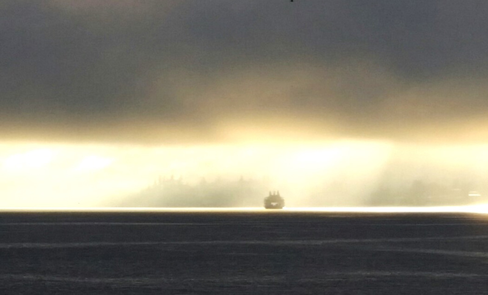Ferry crossing Puget Sound in morning fog
